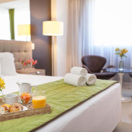 Esuites Savassi Toscanini Belo Horizonte Exterior photo